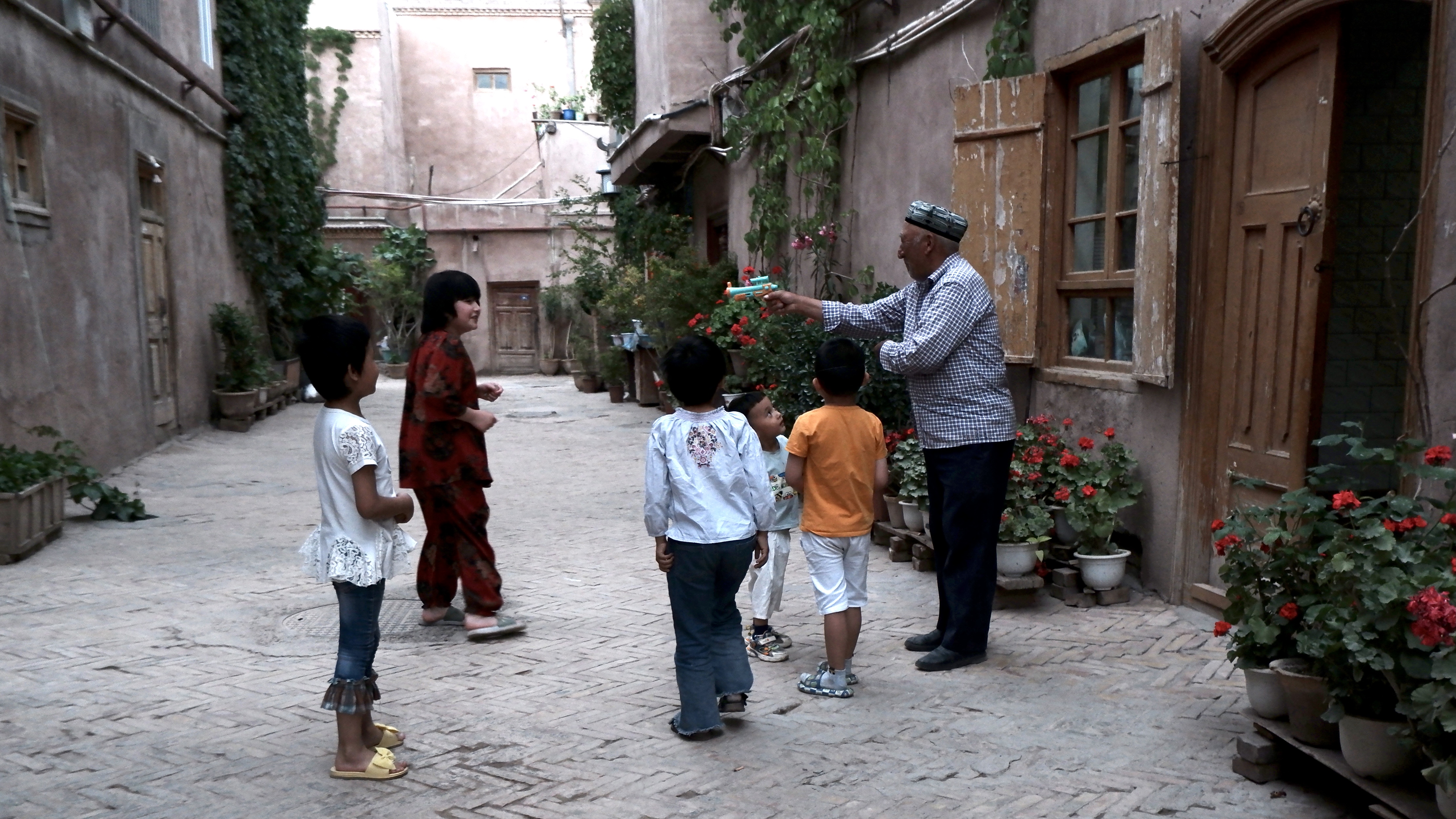 Uyghur people in traditional market in Kashgar